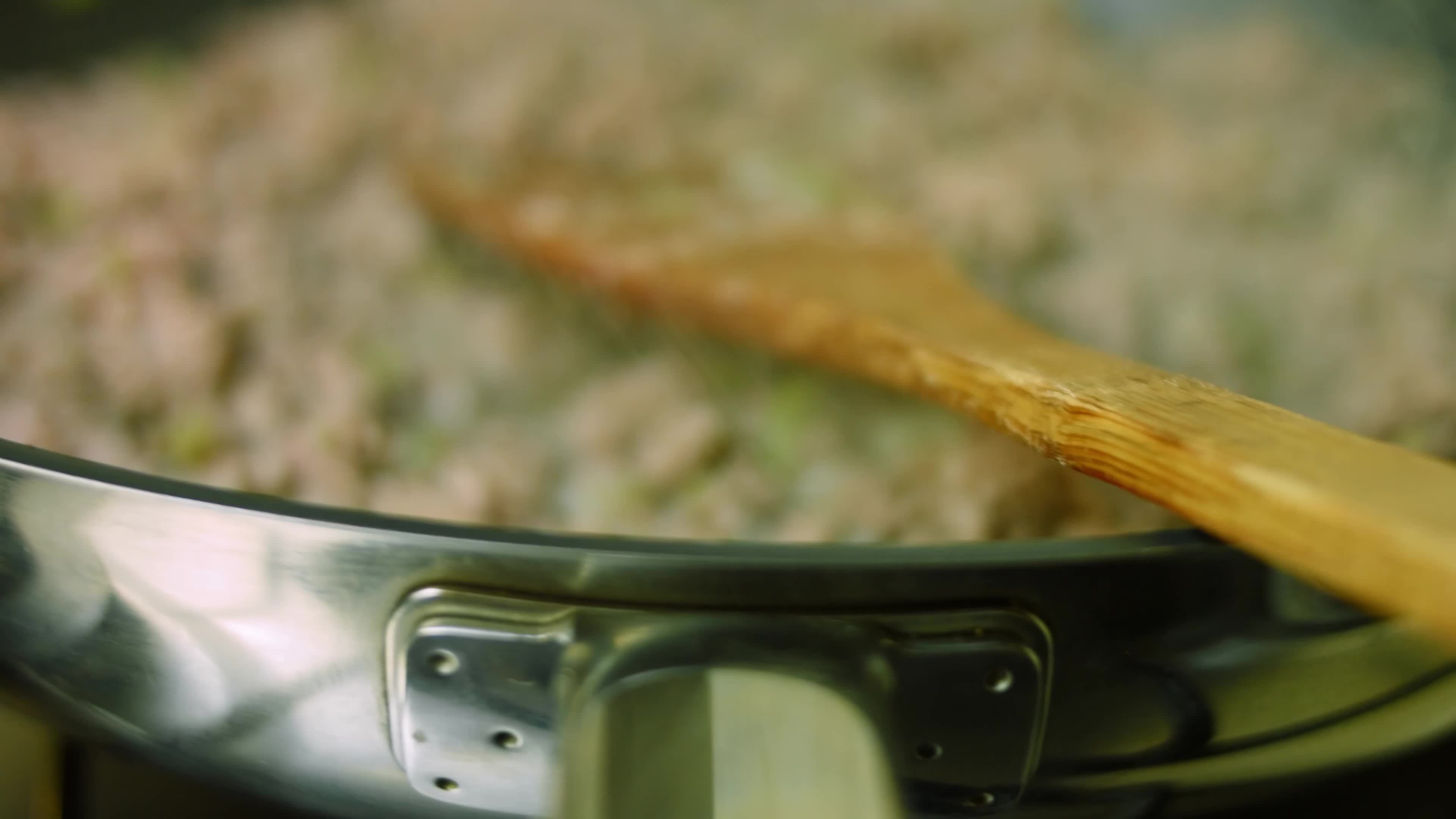 Mix all ingredients with a wooden spoon. Cook chili con carne, Mexican cuisine 15029308 Stock