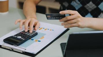 male hands holding a credit card and use mobile phone for Online payment online shopping video