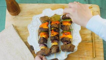 marinated beef kebabs with vegetables prepared on the grill video