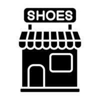 icono de glifo de tienda de zapatos vector