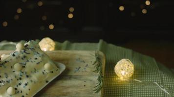 Cake with green dough, sour cherries and sour cream. It also has food ornament and the red star cake video