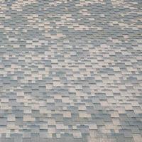 Background mosaic texture of flat roof tiles with bituminous coating photo