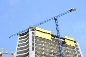 Construction site. High rise multi storey buildings under construction photo