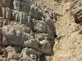 Sands with stone mountain texture background photo