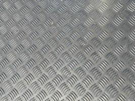 Stainless steel metal plate flooring with crosshatch non-slip texture photo