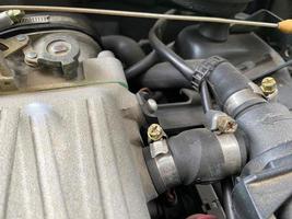 car engine is engine dirty auto parts, dust accumulation. Dusty automobile components photo
