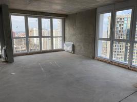 empty apartment in a new building without repair photo