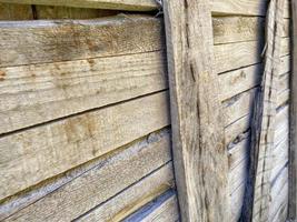 Wooden log cabin texture - interior design in traditional houses. Abstract background with horizontal lines and natural wood pattern with knots on a log wall photo