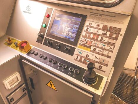 subway driver's cab. train control buttons, remote communication with the dispatcher. electronic control with levers for speed adjustment photo