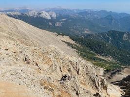 Carson National Forest with Sangre de Cristo mountains and green pine trees in summer and peak overlook from route 76 high road to Taos photo