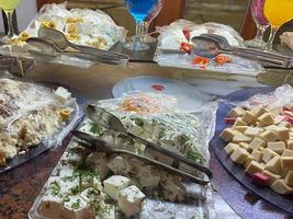 Food on the shelves in the self-service buffet with all inclusive in Turkey photo