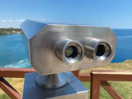 stationary paid binoculars on the observation deck overlooking the sea bay photo