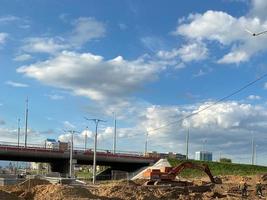 Excavation excavated road during repair and construction using construction equipment and excavators photo