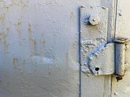 Grunge green metal iron texture background with loops and bolts. space for text or image photo