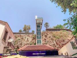 a tall building in a hot, tropical country. for tourists there is an elevator with panoramic windows. lift to the upper floors. sightseeing tour photo