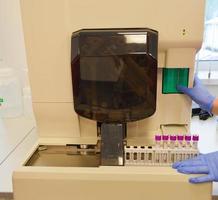 Process of coronavirus testing examination by nurse medic in laboratory lab, COVID-19 swab collection kit, test tube for taking OP NP patient specimen sample, patient receiving a corona test photo