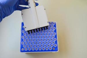 close up. scientists examining liquid samples in the lab photo