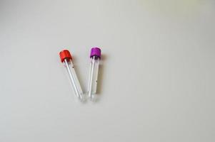 Laboratory medical test tubes on the table photo
