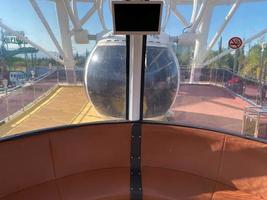 Ferris wheel in public amusement park photo