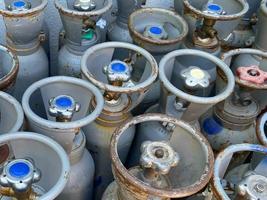 Refrigerant gas cylinders under pressure ready to transport photo