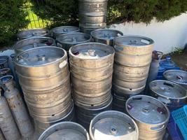 warehouse of special barrels for beer storage - kegs, new aluminum kegs photo