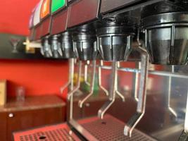 Man pours a fizzy drink.sparkling water.cool ice soft drink cola photo