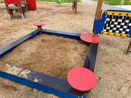 Modern children's playground at a residential block of flats photo