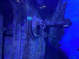 An underwater shot inside a room in the shipwreck of the Kittiwake that uses natural light as opposed to a strobe. The wreck has been sunk deliberately and is shallow enough to allow light penetration photo