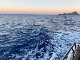 Blue mountains skyline with sea photo