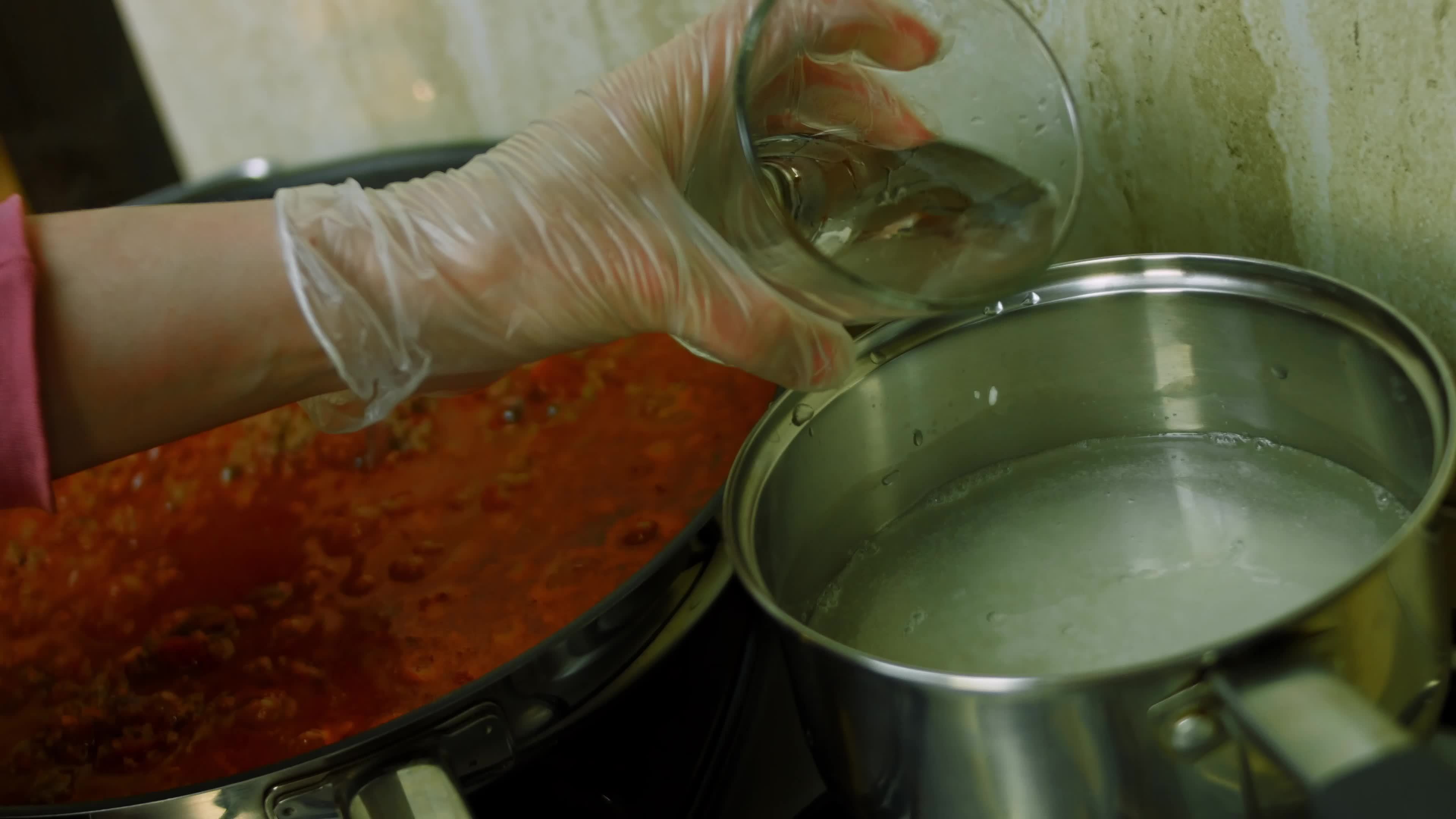 Mix all ingredients with a wooden spoon. Cook chili con carne, Mexican cuisine 15047370 Stock