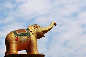 Statue of elephant on a background of blue sky. Chiang Mai, Thailand. photo