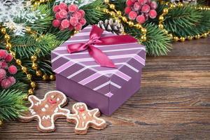 Gingerbread man and a gift box photo