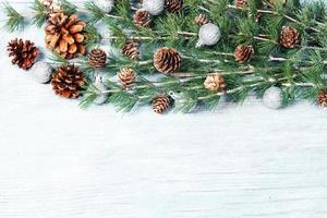 New Year or New Year's Eve background with fir branch with cones. The year 2023 is coming. photo