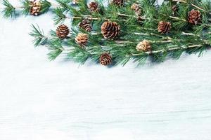 New Year or New Year's Eve background with fir branch with cones. The year 2023 is coming. photo