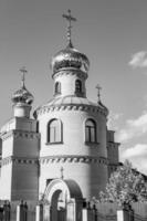 Christian church cross in high steeple tower for prayer photo