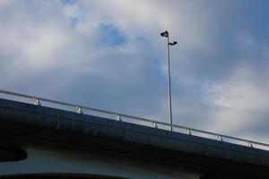 Arch of a modern bridge, engineering work photo