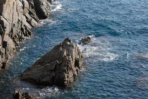 Rocks and sea in the catalan costa brava, mediterranean sea, blue sea photo