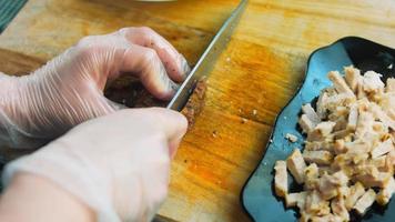 The chef grills pork and beef on the grill video