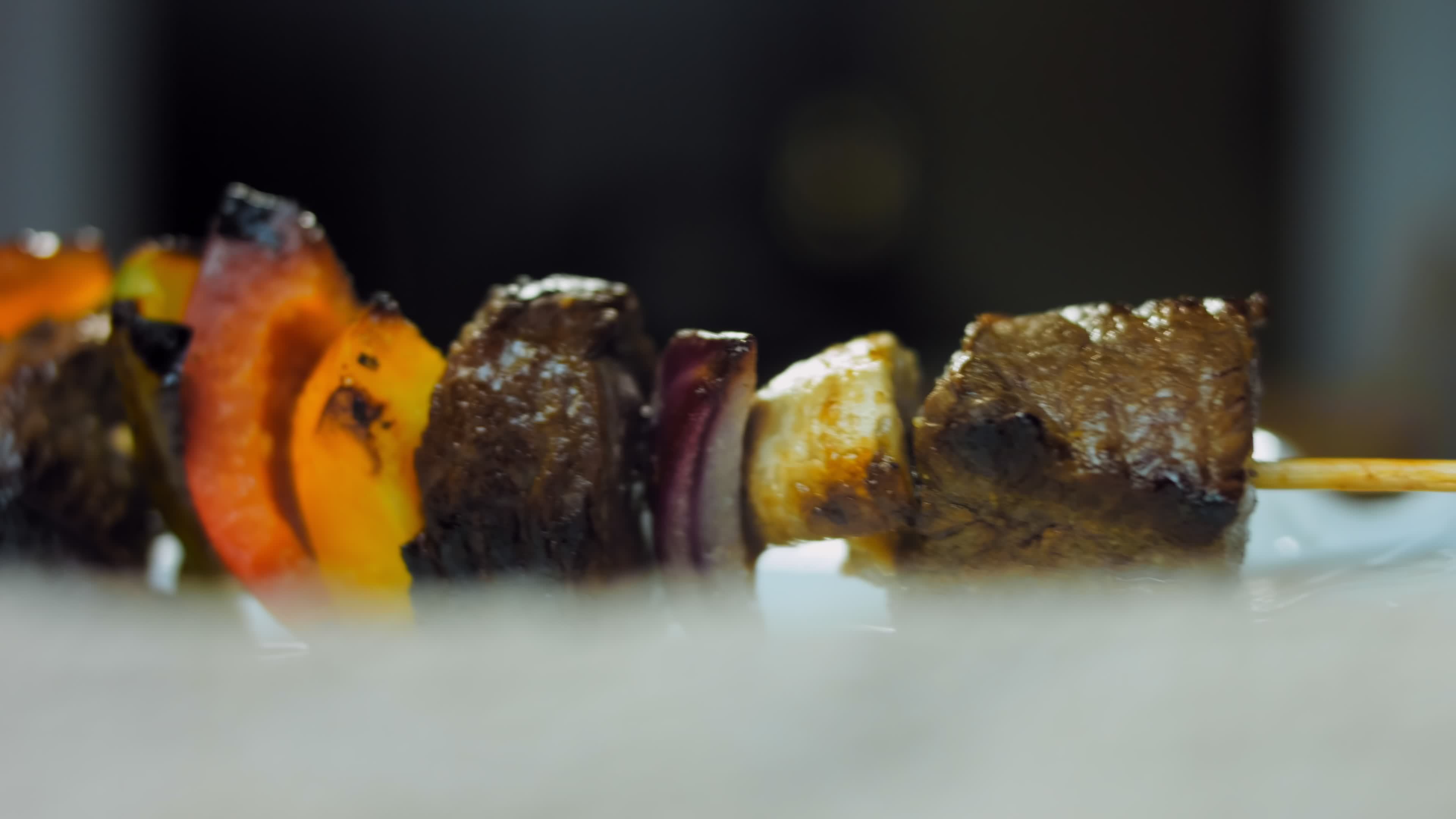 marinated beef kebabs with vegetables prepared on the grill 15072150