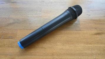 microphone on wooden table photo