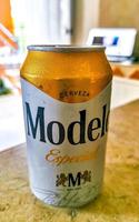 Playa del Carmen Quintana Roo Mexico 2022 A can of beer Modelo on the table in Mexico. photo