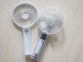 A portable mini fan that was dismantled because it was damaged. photo