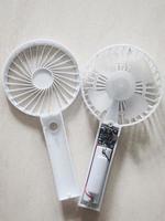 A portable mini fan that was dismantled because it was damaged. photo