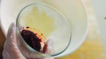 Crush the baked beets with a blender. Macro shooting video