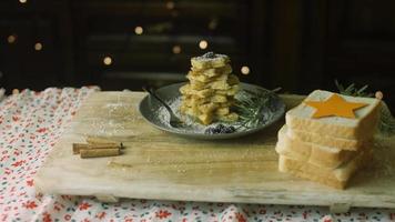 I pour honey on the Christmas tree. French toast christmas tree holiday atmosphere. video
