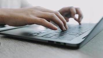 male hands holding a credit card and use mobile phone for Online payment online shopping video