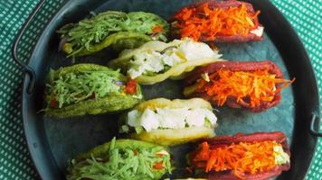 Mexican Flag TACOS. It forms the shape of the Mexican flag on a flat vessel video