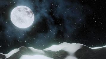 Full moon night. Snow is falling on the top of the hill. Hill. Early winter night. The sky is full of stars, the snow is falling, the moon is shining. 3D rendering video