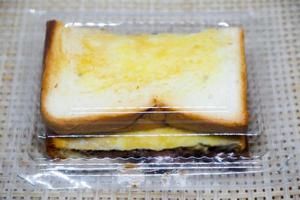 Selective focus of chocolate jam toast in a plastic container. photo