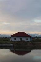 wooden house on the shore of Lake Limboto, Gorontalo-Indonesia photo